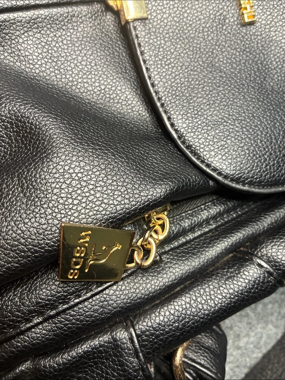Black Leatherette Backpack with Gold Accents